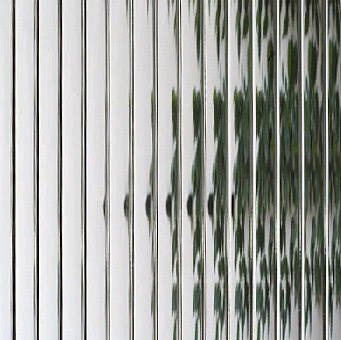 A close up of the glass window with vertical lines