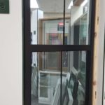 A door with some glass in it